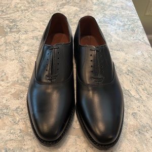 Brand new (never worn) Allen Edmonds men’s dress shoes (black). In original box.